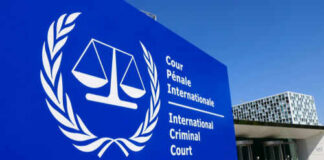 International Criminal Court sign with scales of justice.