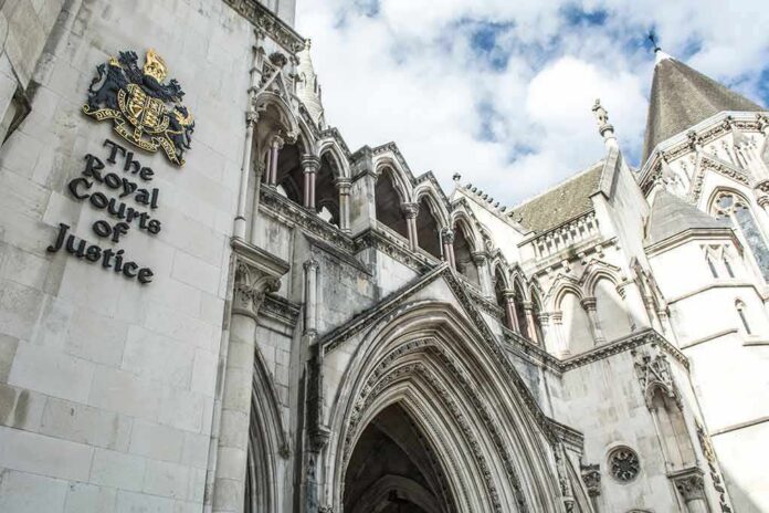 shutterstock_1070816735 Royal Courts of Justice exterior with Gothic arches