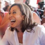 smiling woman in a crowd