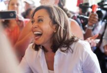 smiling woman in a crowd