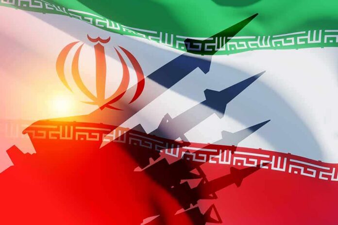 Iranian flag with silhouettes of missiles and military vehicles