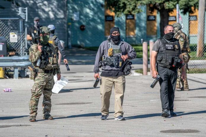 Broadview,,Illinois,,Usa,-,09-26-2025,Protest,At,The,Ice,Processing Law enforcement officers in tactical gear during an operation