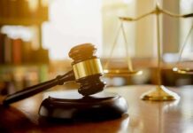 Jurors Expose Chilling Child Support Plot Judge's gavel on a block with scales of justice in the background