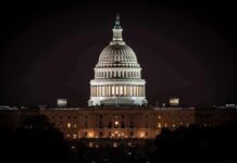 United States Capitol dome illuminated at night