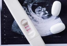 Illegal Pill Boom Exposes FDA Weak Spot Pregnancy test with two lines on an ultrasound print