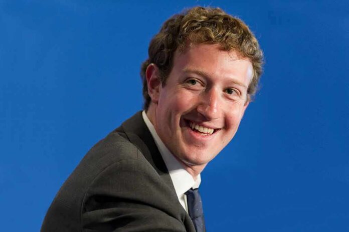 shutterstock_181985696 smiling man in a suit looking to the side