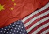 Trump – Xi Showdown: What’s Really at Stake? China and United States flags overlapping