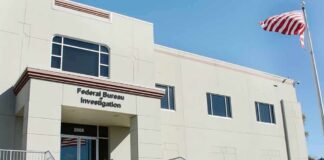 FBI office building with entrance steps and American flag