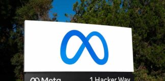 Meta logo sign at 1 Hacker Way outside headquarters