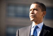 What Did Obama Tell Newsom? man in suit and tie looking into the distance