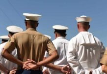 Navy, Marines Dragged Into Teen Assault Claim sailors and marines standing in formation with hands behind backs