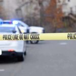 Attempted Murder Avalanche Hits Teen Police tape cordons off a street with patrol cars and flashing lights in the background