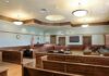 Brutal Chop Count Stuns L.A. Court Empty courtroom with wooden benches and judge's bench