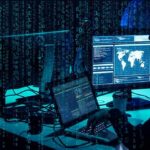 North Korea Steals From US cybersecurity analysts at workstations with code and world map on screens