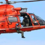Predawn Mayday Sparks Giant Sea Hunt Rescue helicopter with crew performing hoist operation
