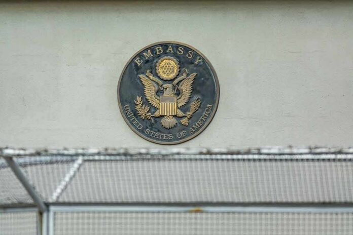 U.S. embassy seal on a building wall