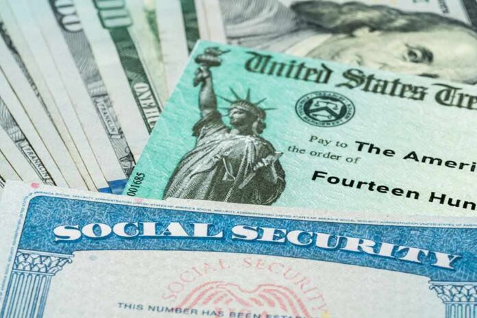 shutterstock_1947115510 Social Security card and U.S. Treasury check on cash