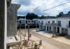 California Shuffle: Survivors Left Waiting Row of newly built townhouses on a construction site