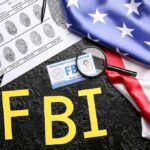 FBI Snags Alleged China Spy At LAX FBI letters with fingerprint sheet, badge, magnifying glass, and US flag