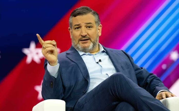 shutterstock_2270811639-1 Ted Cruz speaking on stage, gesturing with one finger raised