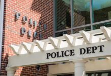 Serious Charges Fail To Halt Police Chief Bid Police department entrance with pergola and brick wall