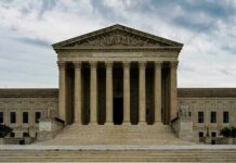 Trump Tariffs Hit A Constitutional Wall Supreme Court building with grand columns and steps