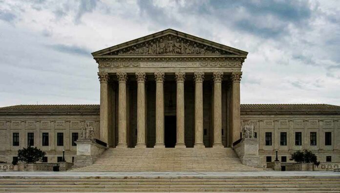 shutterstock_2304961451 Supreme Court building with grand columns and steps