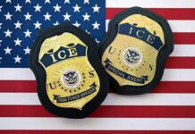 Mayor Clashes With DHS Over ICE ICE badges on an American flag background