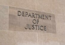LA “Treatment” Empire Sparks DOJ Blitz Department of Justice building wall sign